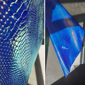 蓝色蛇纹皮革 炫彩镭射反光面料 设计师外套服装防水质感凹凸布料