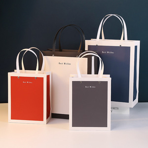 中性简约大气礼品袋铆钉黑白条纹礼物袋白卡纸购物手提袋批发