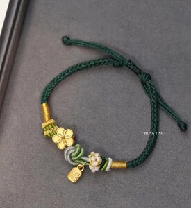 金六福珠宝官方旗舰店桃花福字牌编织手绳足金999浪漫转运送女友