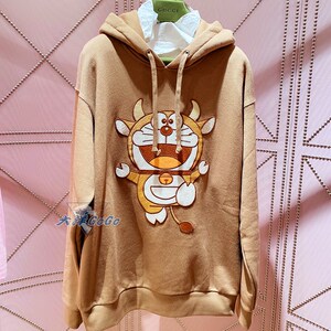 gucci代购21年哆啦a梦五联名爆款棕色牛角叮当机器猫连帽卫衣男女