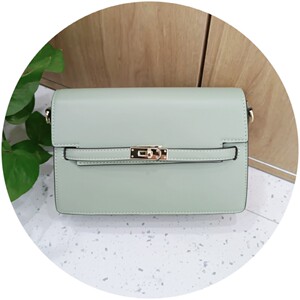 昆仑奴女包专柜正品2022新款欧美时尚潮流单肩包腋下包1595斜挎包