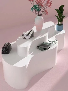 白色落地中岛台简约现代服装化妆品弧形展示台大型商场轻奢展台