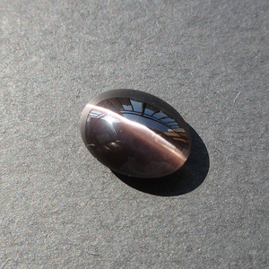 64天然印度强猫眼效应矽线石猫眼椭圆弧面裸石6.6ct