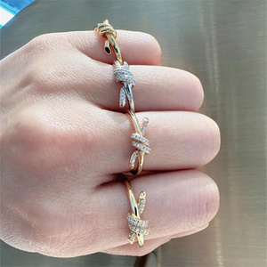 Tiffany/蒂芙尼Kont系列18K玫瑰金黄金打绳结交叉指环镶钻戒指女
