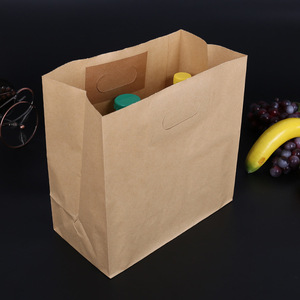 现货牛皮纸手提袋餐盒快餐冲孔手提纸袋外卖食品打包纸袋定制印刷