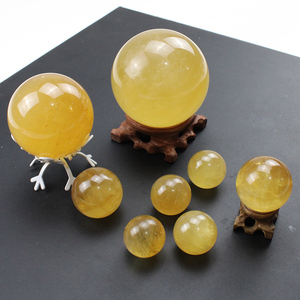 天然水晶球黄色石球方解石球摆件圆风水球桌面发财摆件大小齐全