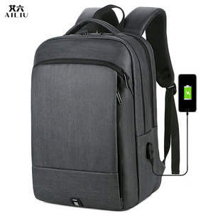 新款USB充电背包韩版休闲双肩包男简约笔记本电脑包时尚纯色背包