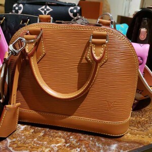 欧洲gogo购 lv 爆款水波纹贝壳包