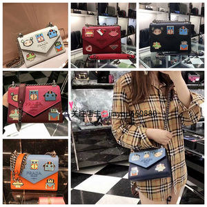 欧洲prada/普拉达女包 卡通机器人徽章十字纹金属单肩斜挎包