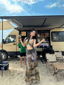 波西米亚小众性感镂空油画吊带连衣裙女泰国度假风修身长裙沙滩裙