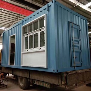 平顶住人集装箱移动房钢化玻璃房钢结构别墅铁皮房子货柜改简易房