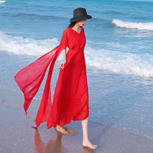 三亚海边度假红色沙滩裙女夏云南旅游拍照衣服连衣裙飘逸长裙超仙