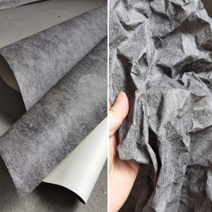 岁月沉淀石碑黑灰痕迹再生纸面料 设计师肌理造型时装服装布料