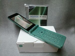 现货-全新〕夏普安卓翻盖机601sh绿色箱说全