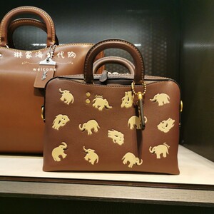 coach棕色rogue大象图案slim brief 25手提公文包c6114