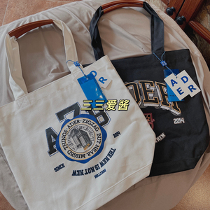 三三爱酱 正品韩国潮牌ader 英伦学院风徽章牛皮帆布包金高银同款