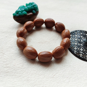 橄榄核四花核手串扁圆橄榄核原皮橄榄胡手串