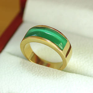 韩版简约黄金色绿色猫眼石钛钢戒指男个性潮人食指戒子女首饰礼物