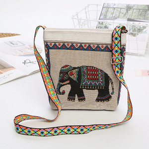 00kjyf2005淘宝少数名族斜挎包傣族包包男女同款有内衬拉链装手机