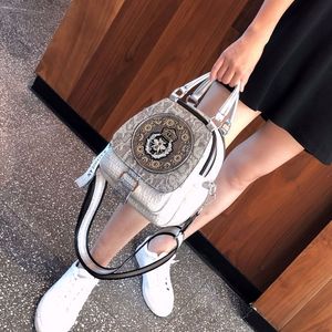 香港代购真皮包包女2024新款双肩包斜挎时尚烫钻小背包旅行包书包