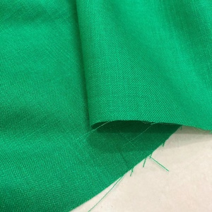 新款夏季绿色麻面料凉爽麻裤子女士连衣裙服装布料草绿色西装裤