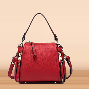 韩版真皮包包春夏新款厂家斜挎包手提 旅行单肩水桶包 女包