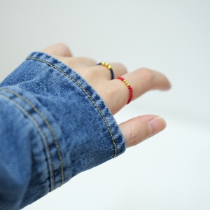 定制情侣款黄金对戒编织红蓝绳素金戒指足金转运珠四叶草金珠指环