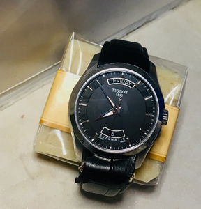 天梭 库图系列1853瑞士自动机械表时尚男表 黑盘皮带 t0