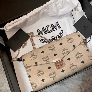 mcm中号米色链接链条包 材质:牛皮 款式:单肩包 品牌:m