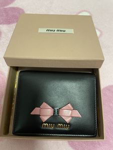 miumiu钱包蝴蝶结