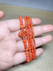 海里的红33手串天然的