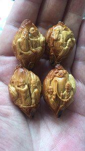 天佑艺人李岩本工作品 琴棋书画橄榄核雕一套