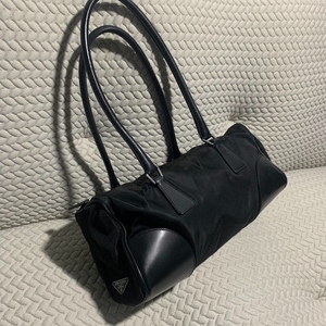 000人付款淘宝prada普拉达牛皮单肩包法棍包公文包圆筒包水桶包腋下包