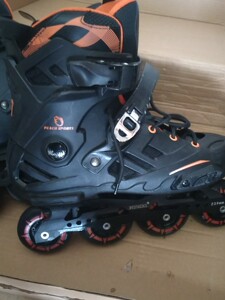 帕奇绝代双骄黑橙色轮滑鞋