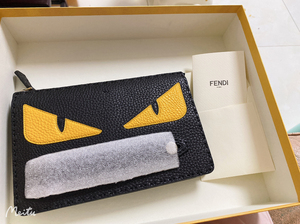 fendi/芬迪 小怪兽黄眼睛手包 手拿包