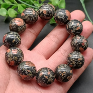 精品安山岩玉梅花玉手串