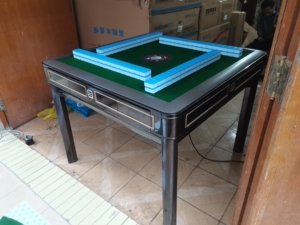 上海立明麻将机.配两幅48大麻将,送货上门,保修三个月