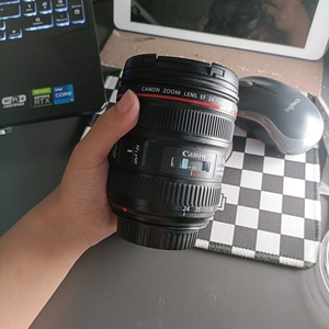 000人付款淘宝佳能2470f4镜头,带微距功能,成色比较新,买来