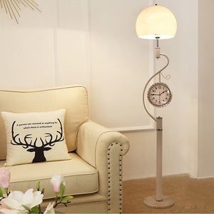 热销后现代简约客厅带钟表立式灯落地灯卧室角落沙发创意铁艺灯具