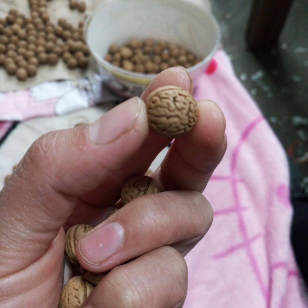 山核桃颈椎枕头按摩枕纯手工编织桃核枕缓解颈椎酸痛送一串新品