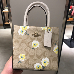 美国小正蔻驰代购coach女包小雏菊cally琴谱包迷你托特包小方包