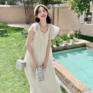 法式慵懒风白色长裙2024夏季新款高级感温柔大摆型显瘦度假连衣裙