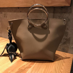 磨砂皮包包女圆环包手提包斜跨女包包中包磨砂新款复古包饺子包