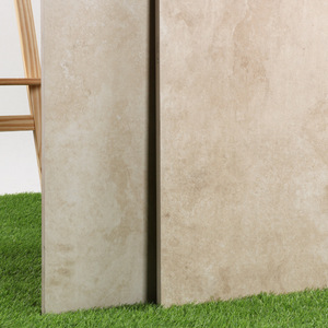 2cm厚仿罗马洞石米黄石英砖仿石pc砖6001180别墅销售大厅酒店景墙