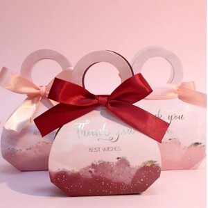 中国风喜糖盒圆形糖果盒酒红色高级感礼物盒复古手提小清新纸盒子