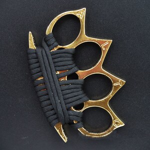 0024人付款淘宝玻纤虎指拳扣四指合法车载防身武器手撑子戒指环自卫