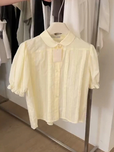 韩版气质时尚奶黄色压褶衬衫女夏季新款设计感褶皱花边娃娃衫上衣