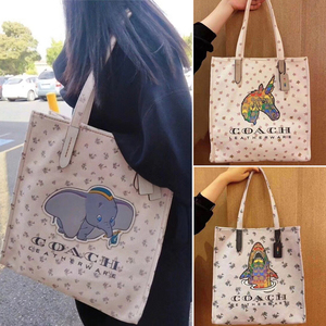 coach/蔻驰 kouchi女包迪士尼小飞象帆布包单肩手提购物袋托特包