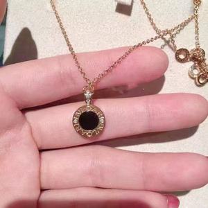 bvlgari宝格丽圆盘项链18k金镶钻黑白玛瑙时来运转双面锁骨链