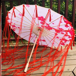 女子配汉服的伞油纸伞古装北极星空裙紫山海集防雨飘带古风流苏伞